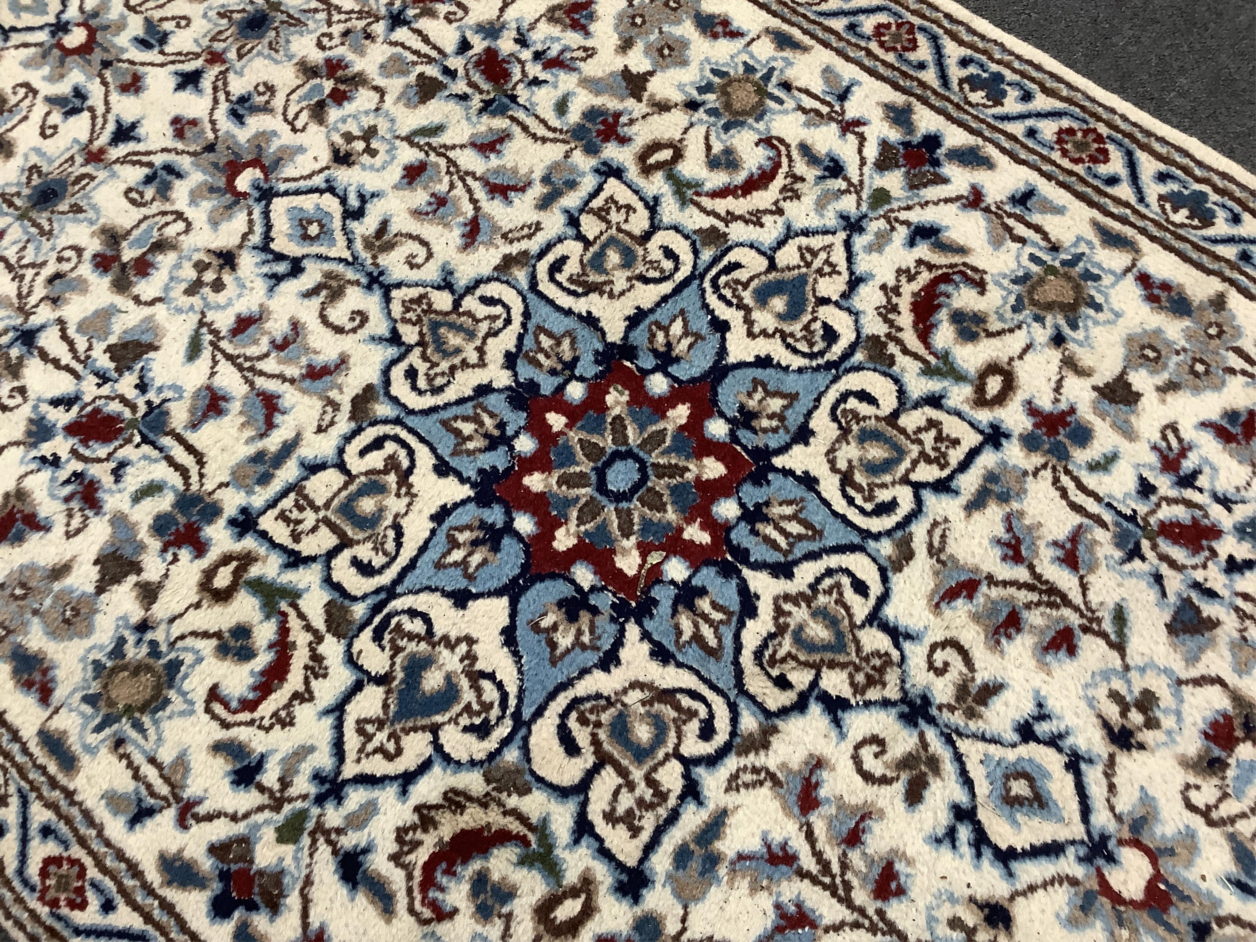 A Nain ivory ground runner, 386 x 86cm